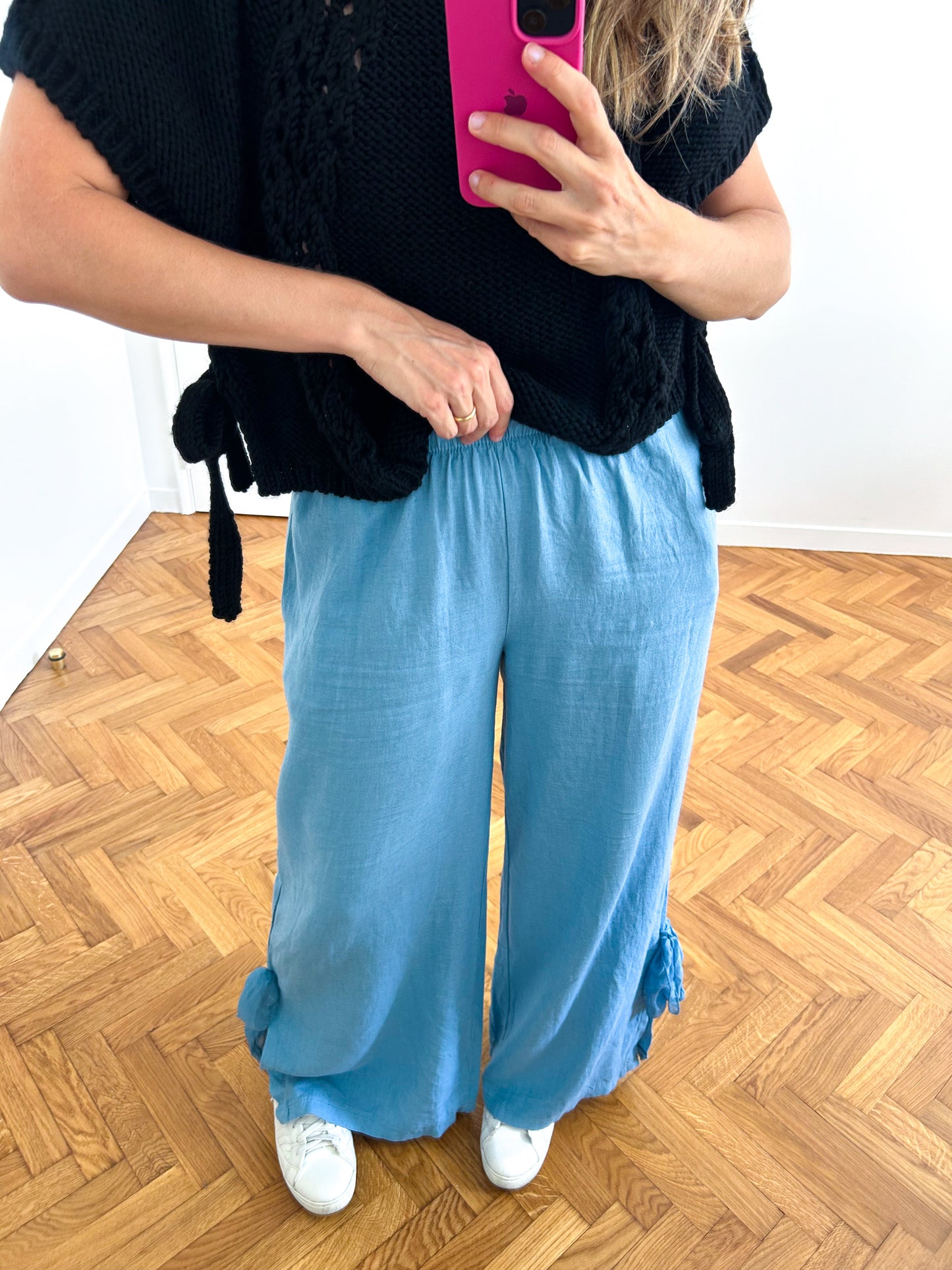 Pants with bow at the bottom