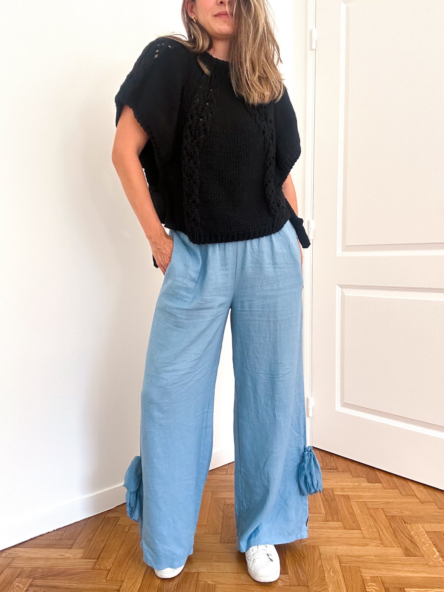 Pants with bow at the bottom