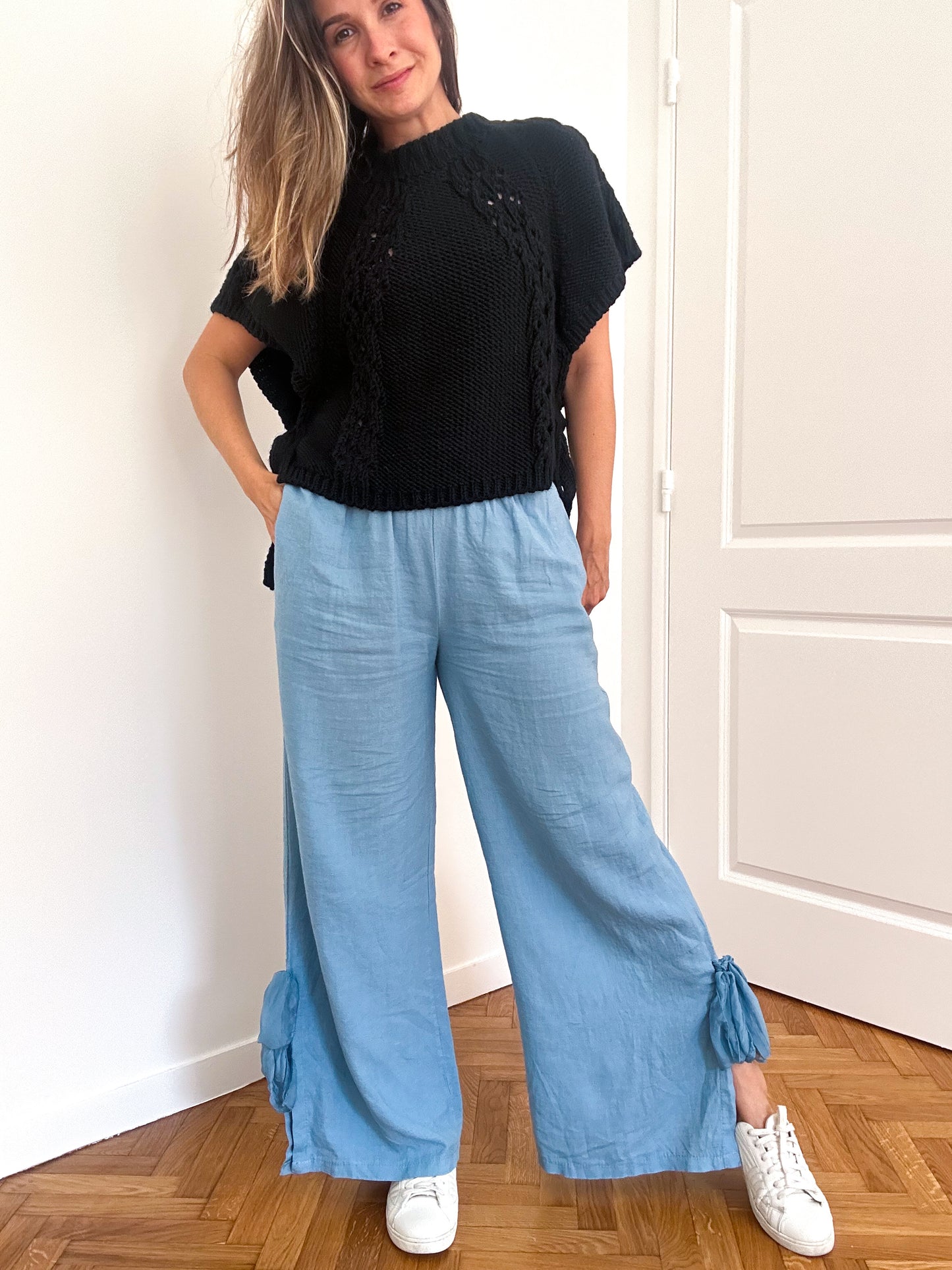 Pants with bow at the bottom