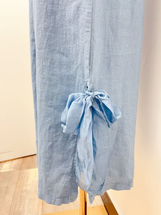 Pants with bow at the bottom